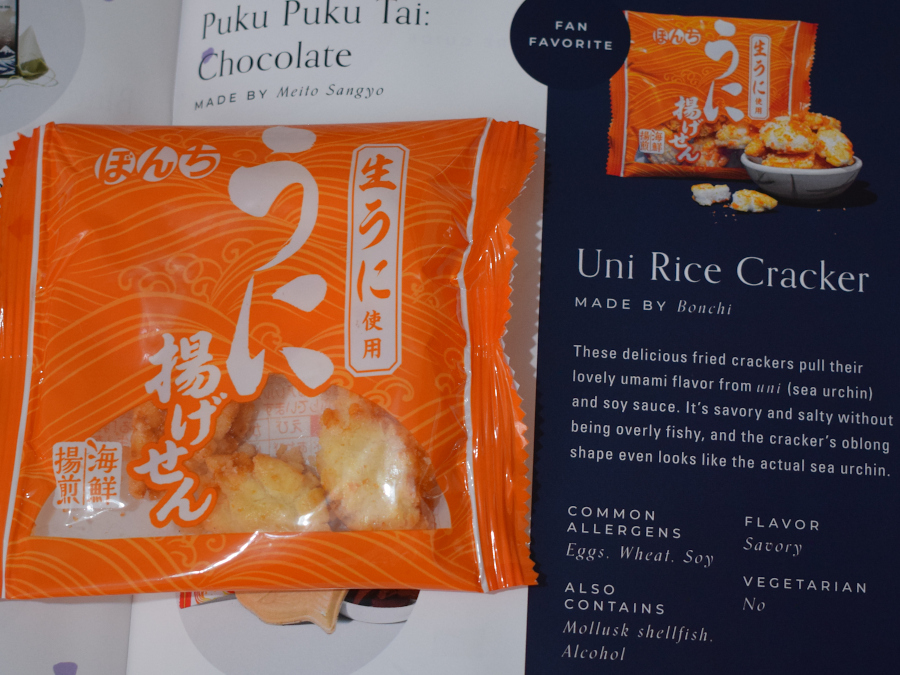 A single packet of rice treats next to a leaflet describing it